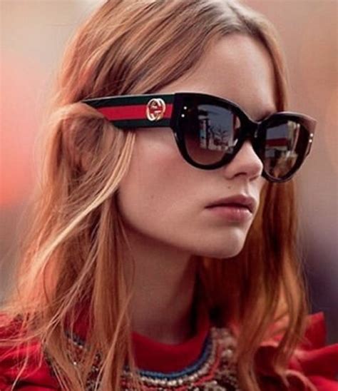 lady with gucci sunglasses
